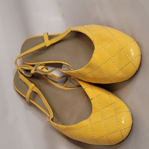 Yellow quilted flats